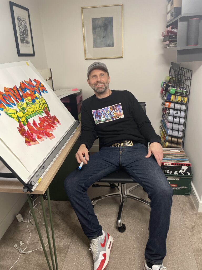 Showing off completed graffiti art in the studio - contact for more information